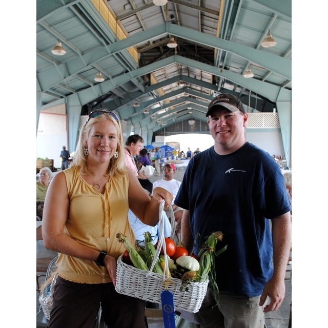 Carrie and Jeremy Johnson with the first prize basket of mixed vegetables.